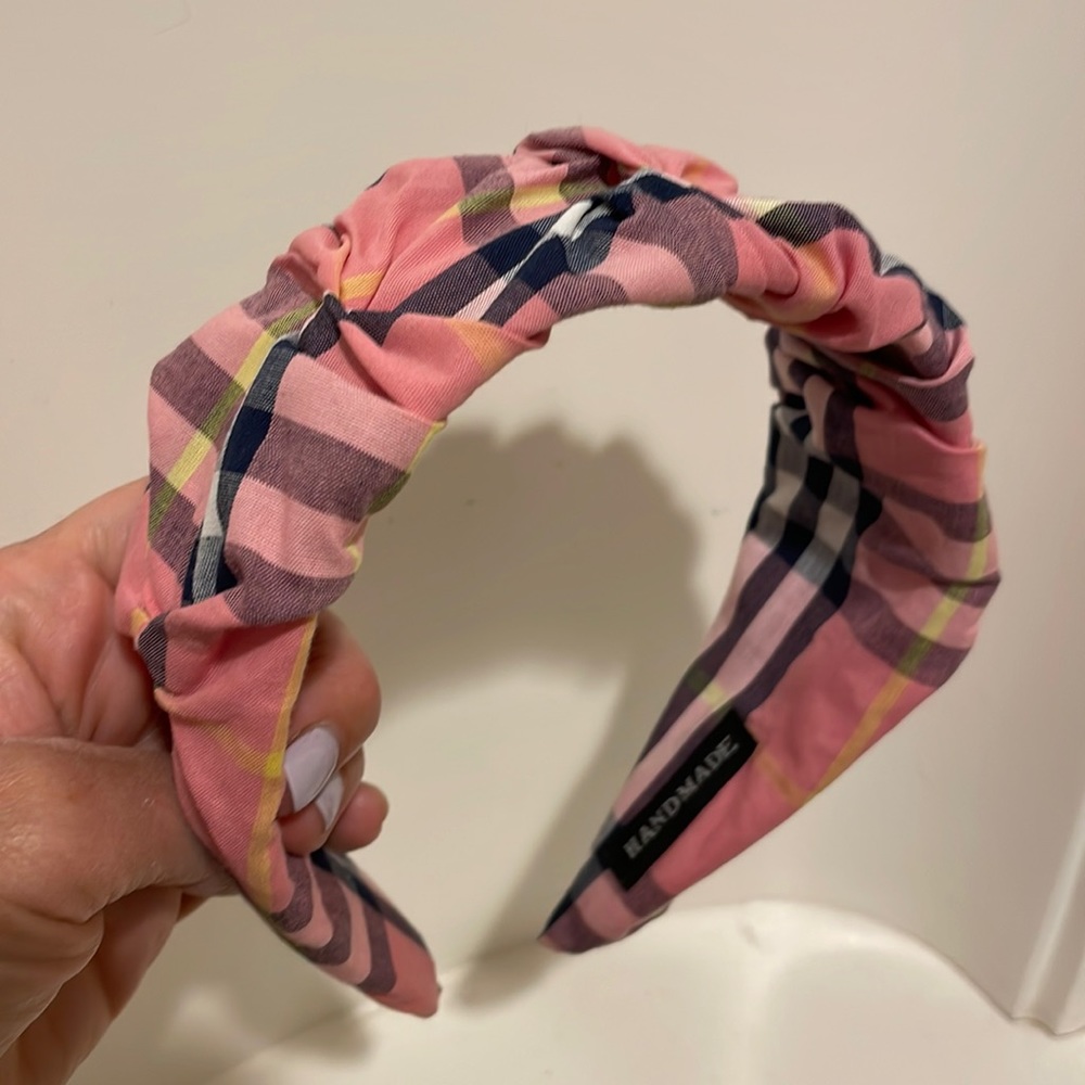 Never Worn Pink Plaid Headband. Inside is very flexible so does not hurt.